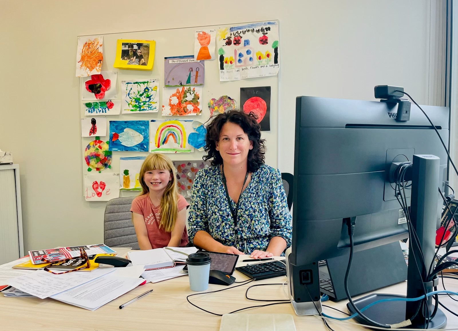CPSU National Secretary Melissa Donnelly at work in the office with her daughter. 